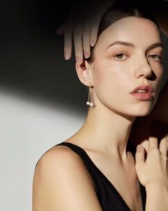 Woman wearing Greta Earrings from the Bernhard H. Mayer Pearl Icons Collection