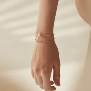 Wrist adorned with Greta Bracelet with Akoya Pearl from Bernhard H. Mayer